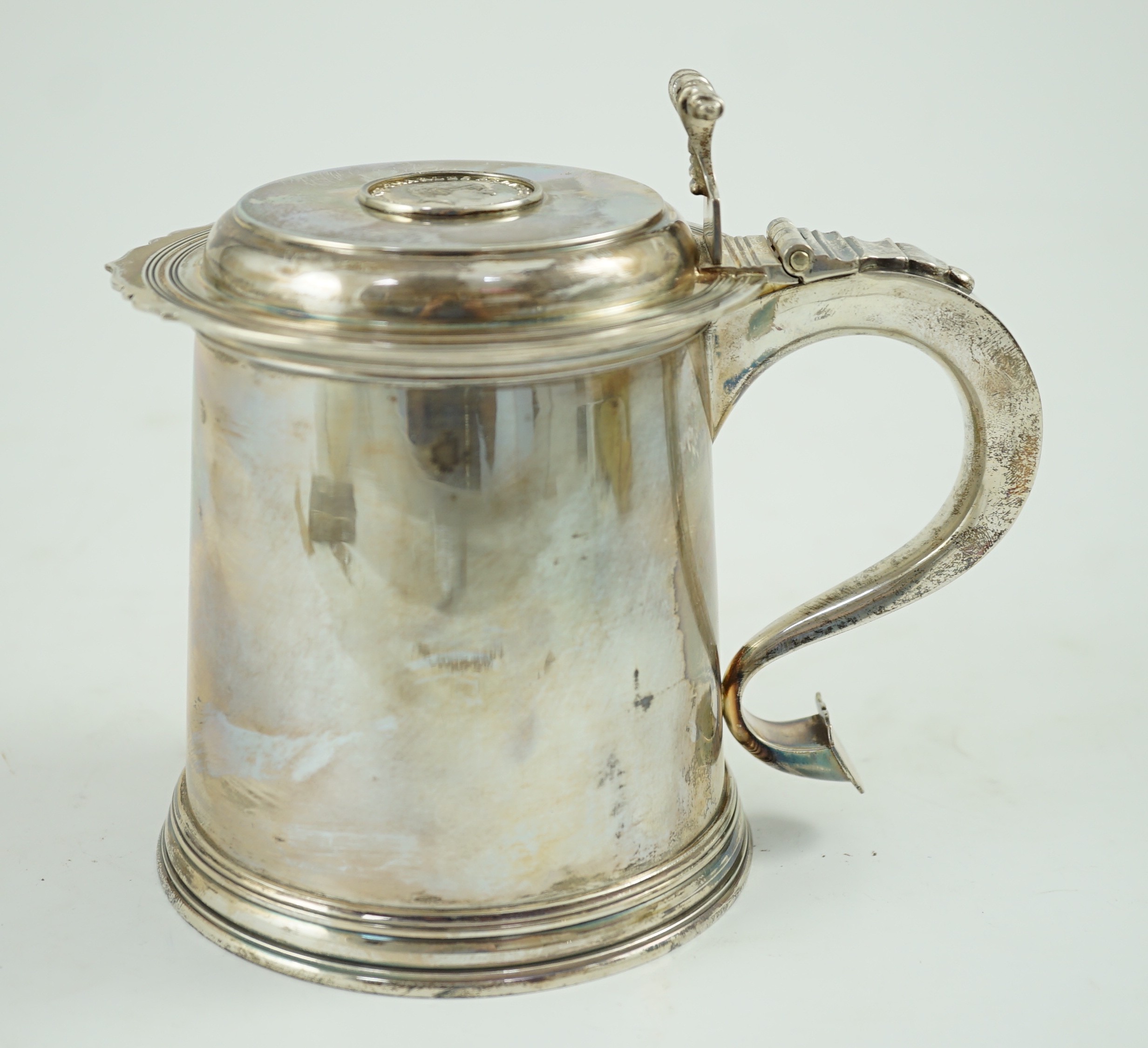 An Elizabeth II limited edition silver tankard, to commemorate the investiture of Charles as Prince of Wales at Caernarvon Castle, 1st July, 1969, Wakely & Wheeler, London, 1969